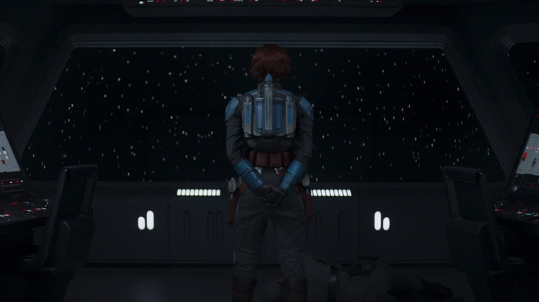 Bo-Katan stares out into space