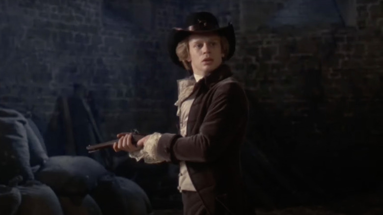 Leon Vitali in Barry Lyndon holding gun