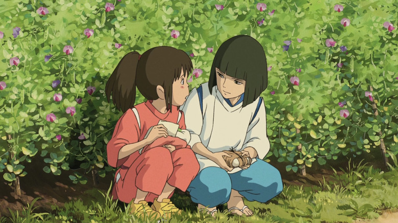 Chihiro talking to Haku