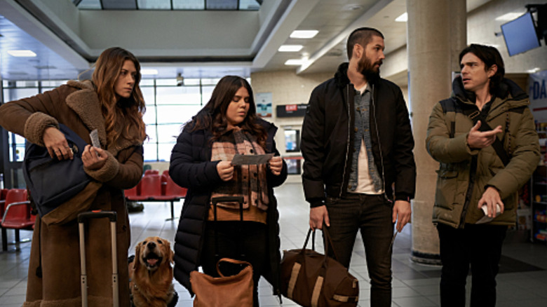 Murphy, Max, Jess, and Felix at the airport