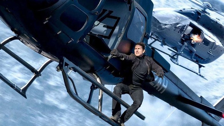 Ethan Hunt hanging from helicopter