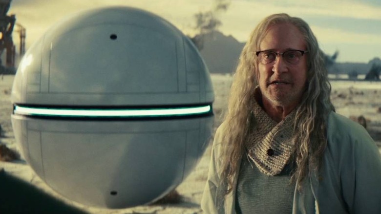 Dr. Okun in front of alien sphere