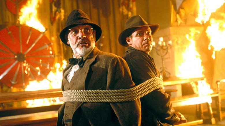 Henry Sr. and Indiana Jones tied up