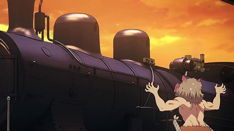 Inosuke admiring a train