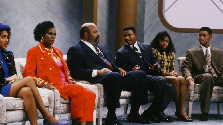 The Banks family sitting together on a game show