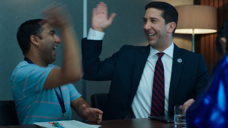 Schwimmer and Mohammed high-five