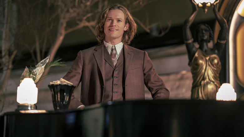 Lestat looks mischievous wearing suit