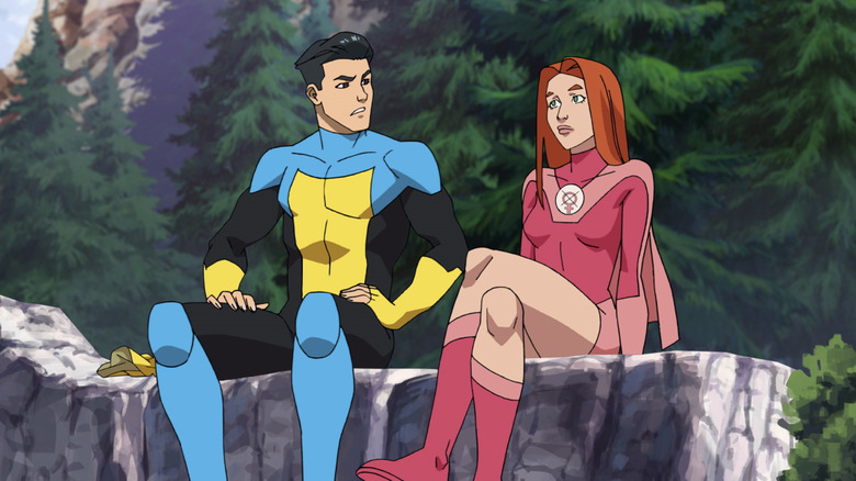 Invincible and Atom Eve in woods