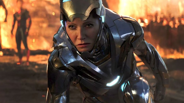 Pepper Potts kneeling down in her armor