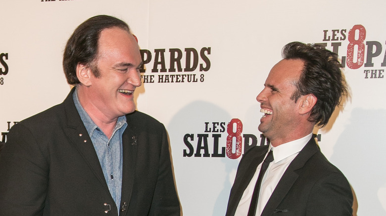 Quentin Tarantino and Walton Goggins laughing