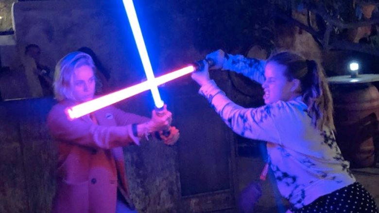 Brie Larson with lightsaber at Disney