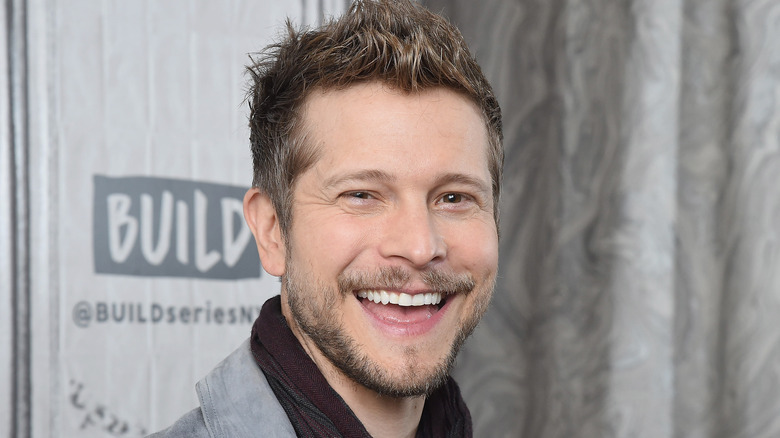 Matt Czuchry grinning