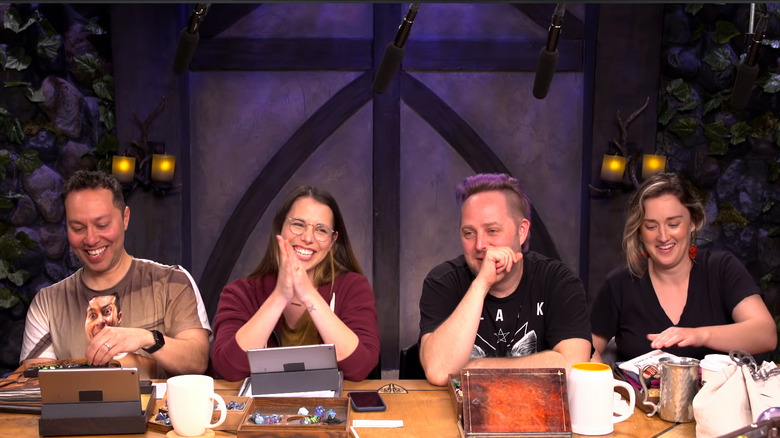 Sam, Laura, Taliesin, and Ashley laugh together