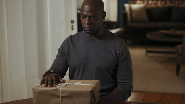 The Blacklist Dembe touches box