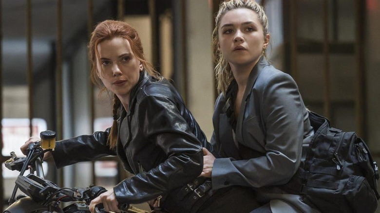 Black Widow and Yelena Belova on a motorcycle