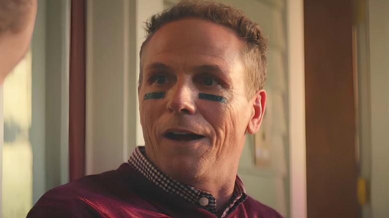 CJ's dad wearing eye black