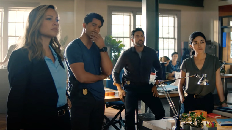 Cast of NCIS Hawaii in police station