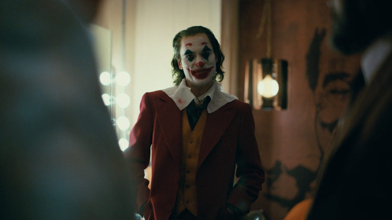 Joker standing far back from the camera