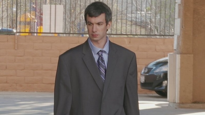 Nathan Fielder wearing an oversized suit