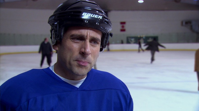 Michael Scott pursing lips in hockey gear