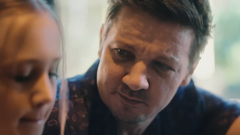 Jeremy Renner looking at Ava Renner