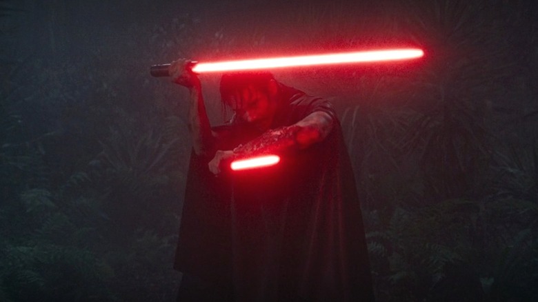 Qimir holding two lightsabers