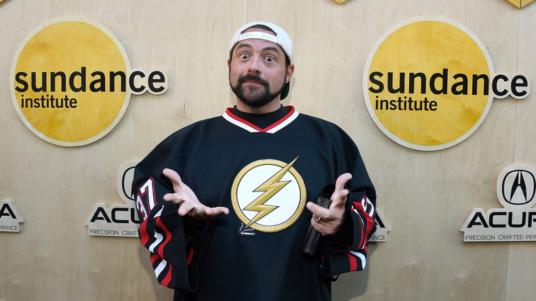 Kevin Smith wearing a Flash jersey