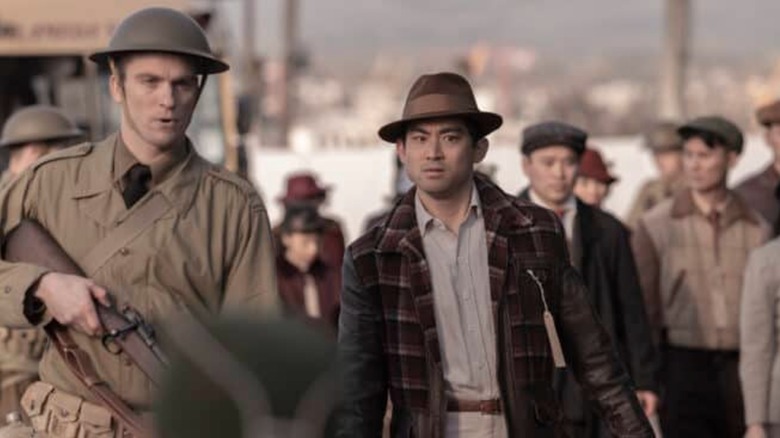 An American soldier leads Japanese American detainees in "The Terror: Infamy" (2019)