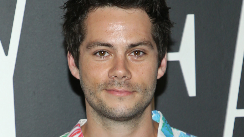 Dylan O'Brien smirking