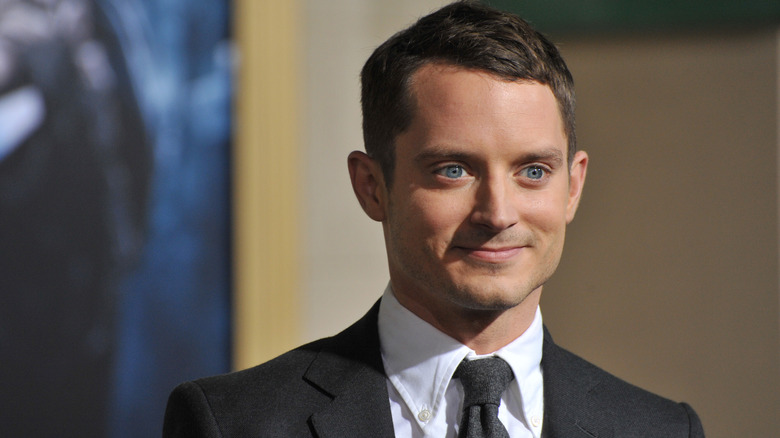 Elijah Wood suit smiling