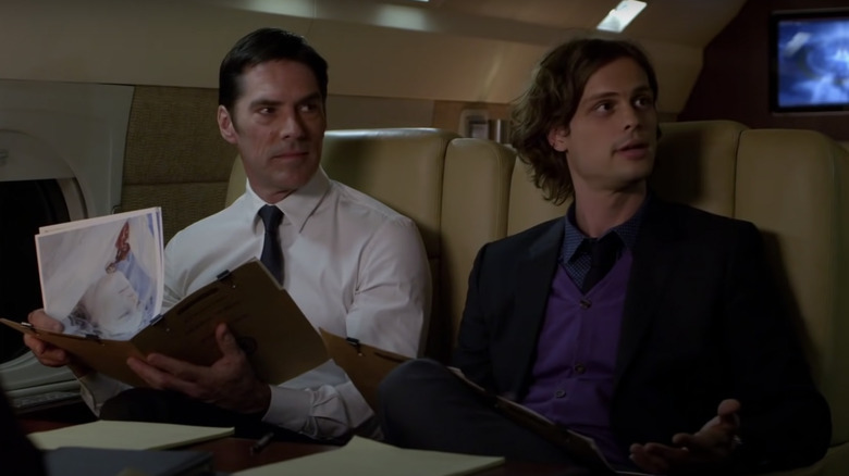 Agents Hotchner and Reid on the BAU jet