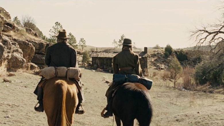 Rooster Cogburn and Mattie Ross on horseback