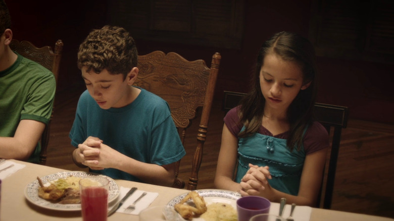 Young Jack and Young Nadia praying