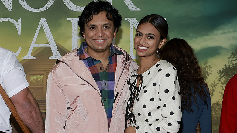 M. Night Shyamalan and Ishana Night Shyamalan smiling 