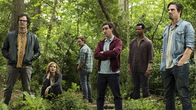 The Losers Club standing in the woods