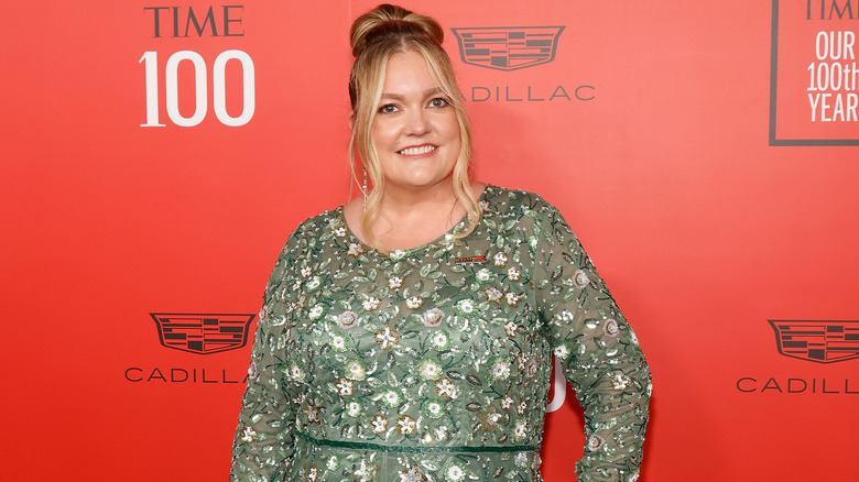 Colleen Hoover wearing green dress