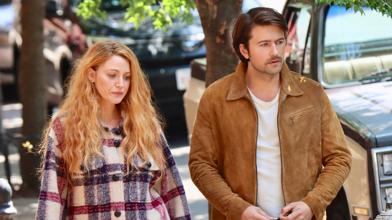 Blake Lively and Brandon Sklenar walking