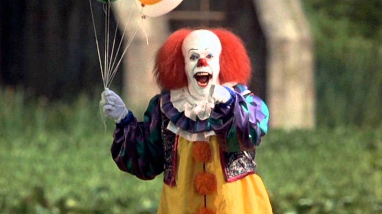 Pennywise pointing and laughing