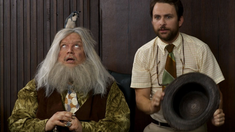 Charlie and Pappy with bird on his head