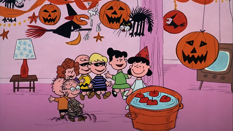 The Peanuts gang dancing