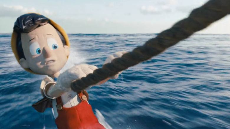 Pinocchio wakeboarding in the live-action Pinocchio