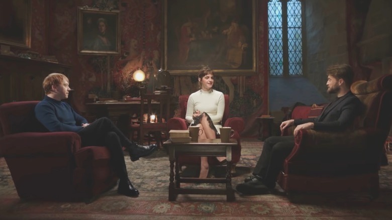 Rupert Grint, Emma Watson, and Daniel Radcliffe talking