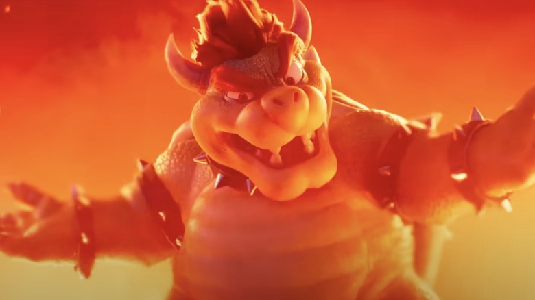 Bowser stands with arms outstretched 