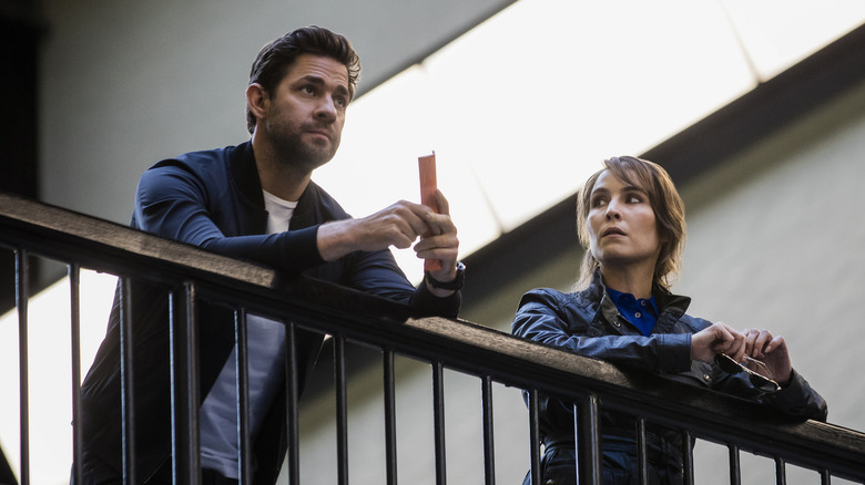 Jack and Noomi talking on balcony