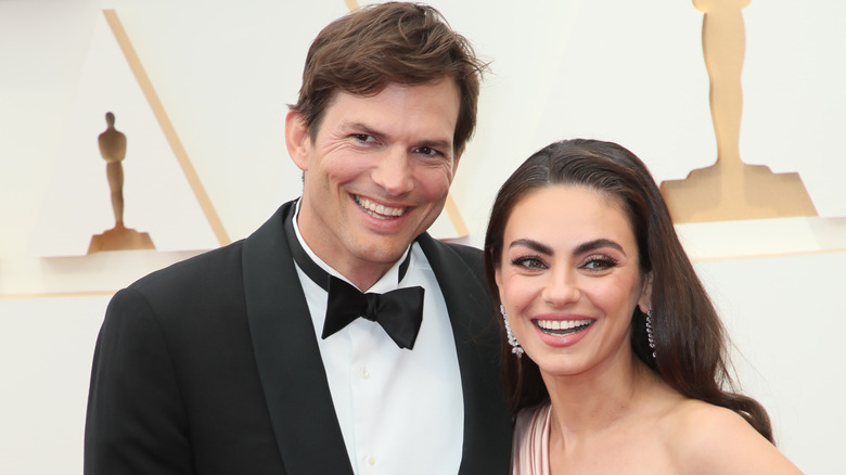 Kunis and Kutcher pose together 