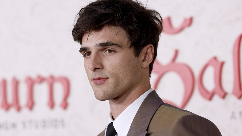 Jacob Elordi wearing brown suit