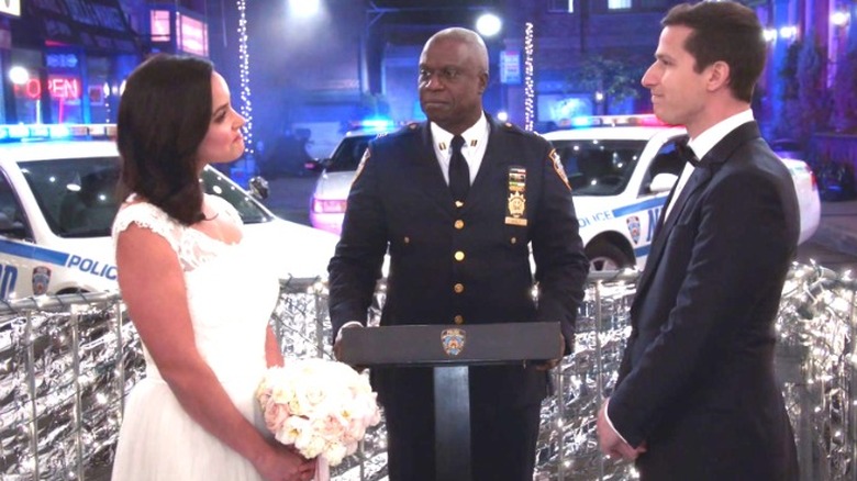 Holt marries Amy and Jake