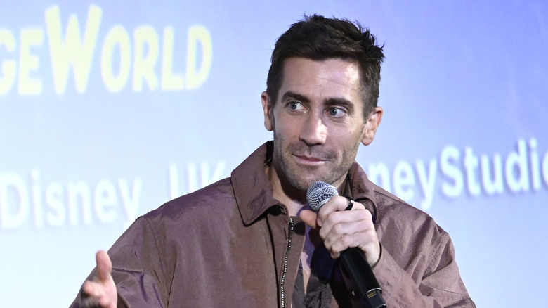 Jake Gyllenhaal speaking onstage at an event