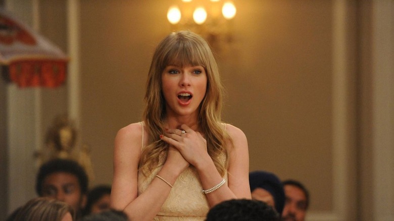 Taylor Swift in New Girl looks surprised 