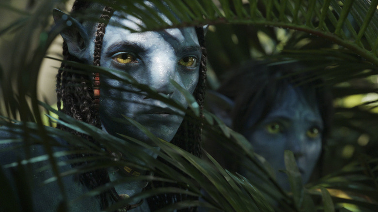 Britain Dalton as Lo'ak and Sigourney Weave as Kiri